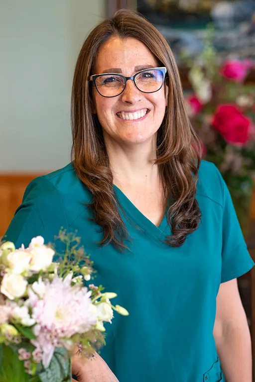 Image of Laura, Registered Dental Hygienist, smiling.